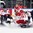 COLOGNE, GERMANY - MAY 9: Denmark's Jesper B. Jensen #41 gets tripped up by the Slovakian defender as Julius Hudacek #33 attempts to make the save and Michal Sersen #8 and Mads Christensen #12 look on during preliminary round action at the 2017 IIHF Ice Hockey World Championship. (Photo by Andre Ringuette/HHOF-IIHF Images)

